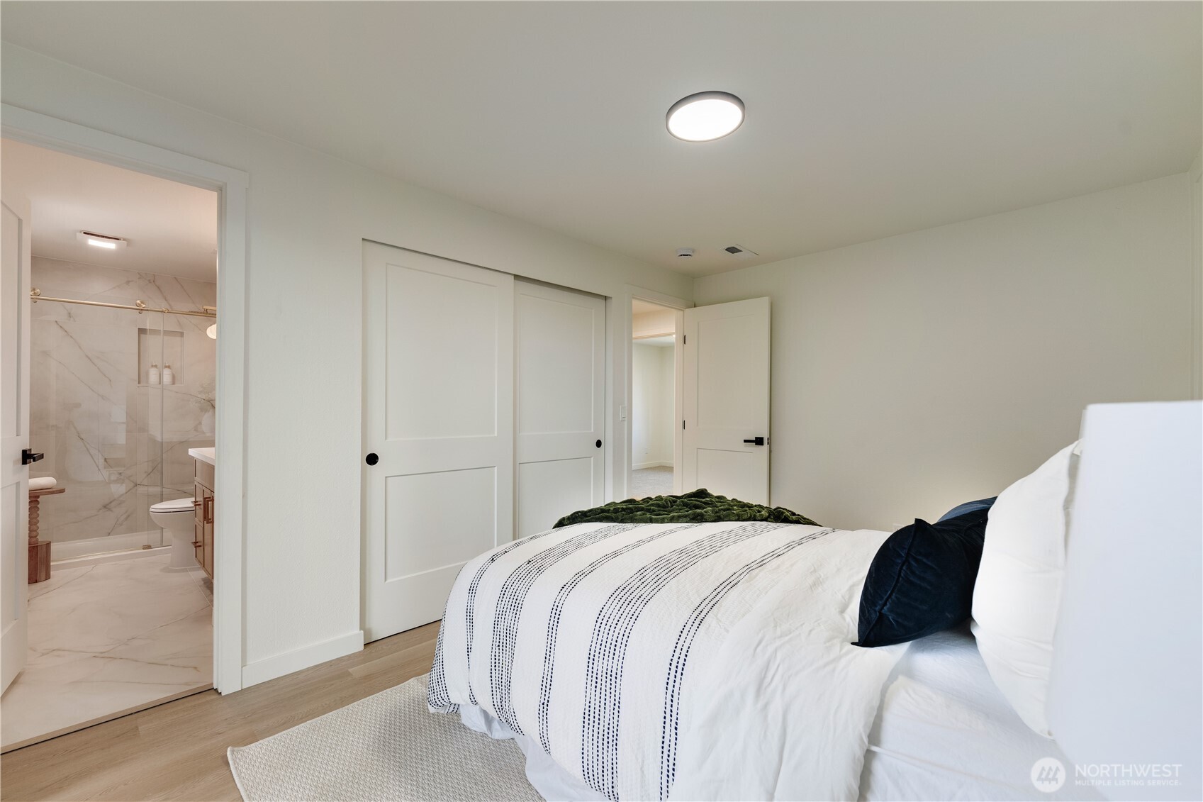 416 221st Street Southwest Bothell, WA 98021 - Photo 29 of 40 a bedroom with a bed and a shower