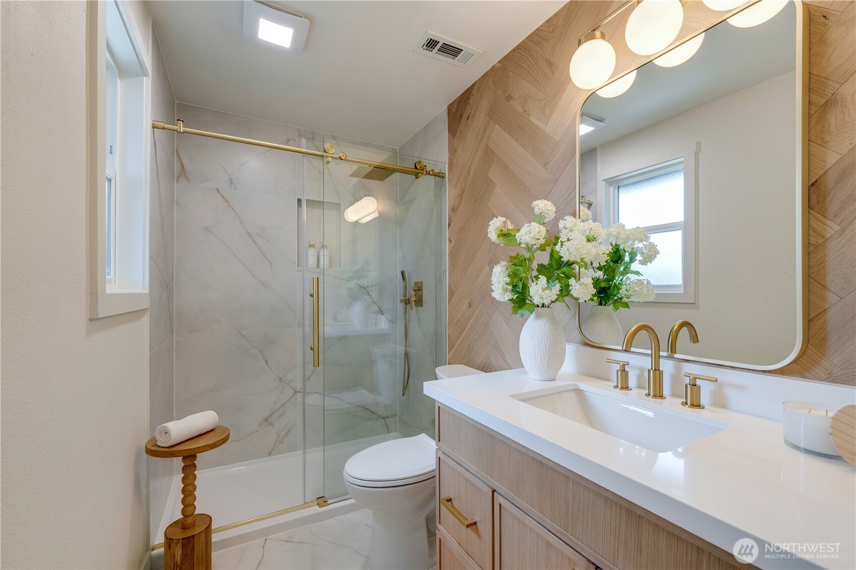 416 221st Street Southwest Bothell, WA 98021 - Photo 30 of 40 a bathroom with a sink a toilet and shower