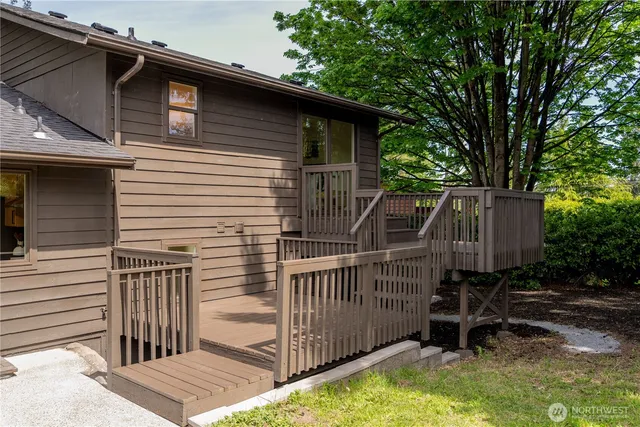 a view of backyard with deck