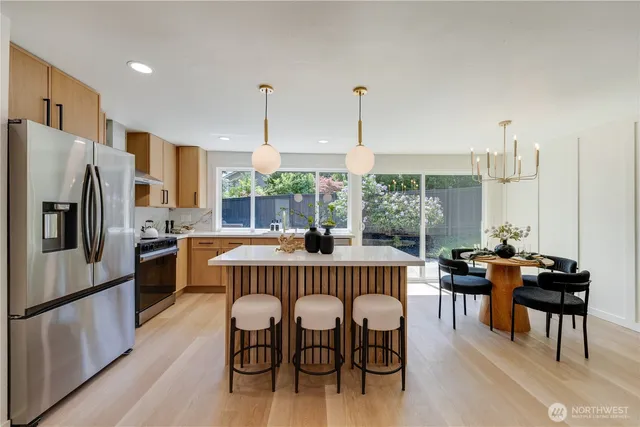 a kitchen with sink and window