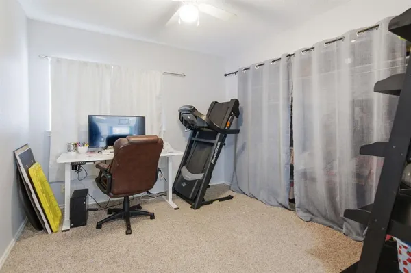 a view of workspace with furniture and a chair