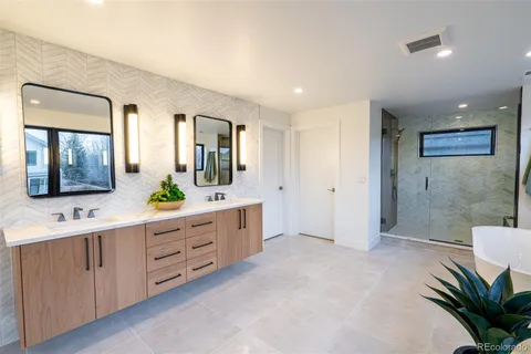 a view of entryway and hall with a chair