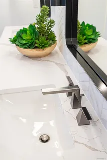 a dining room with furniture and entryway