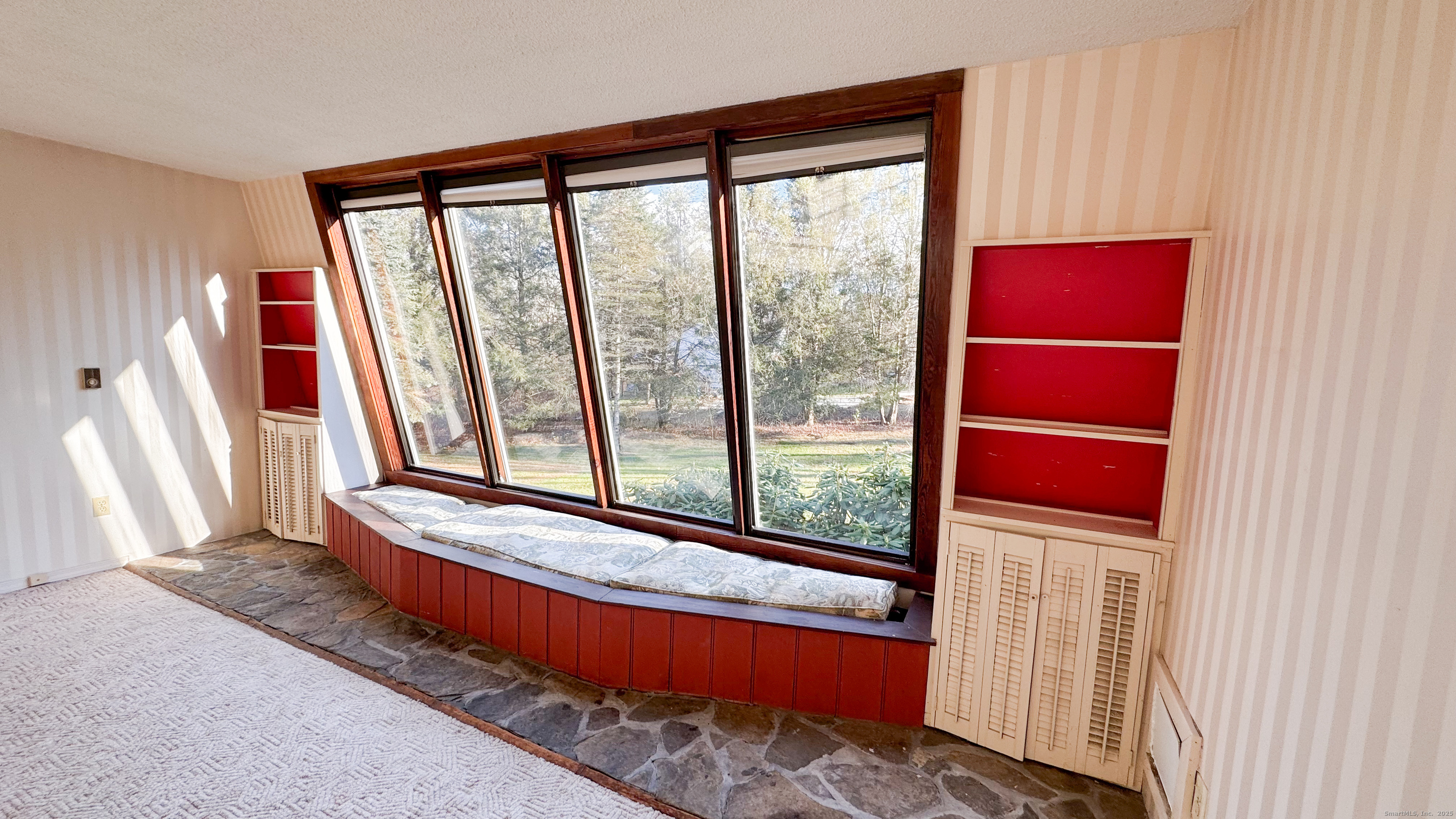 338 Main Street Hampton, CT 06247 - Photo 15 of 31 a living room with a large window and walk in closet