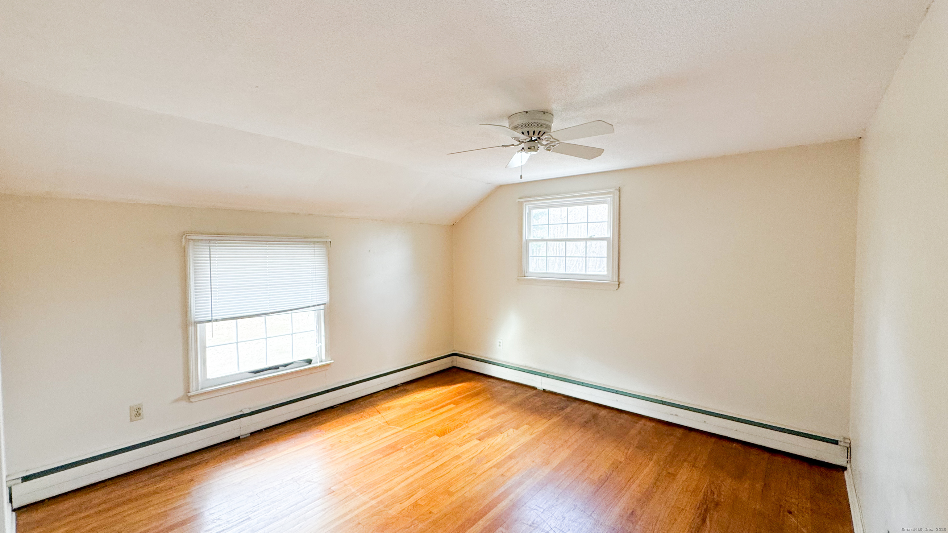 338 Main Street Hampton, CT 06247 - Photo 21 of 31 wooden floor in an empty room with a window