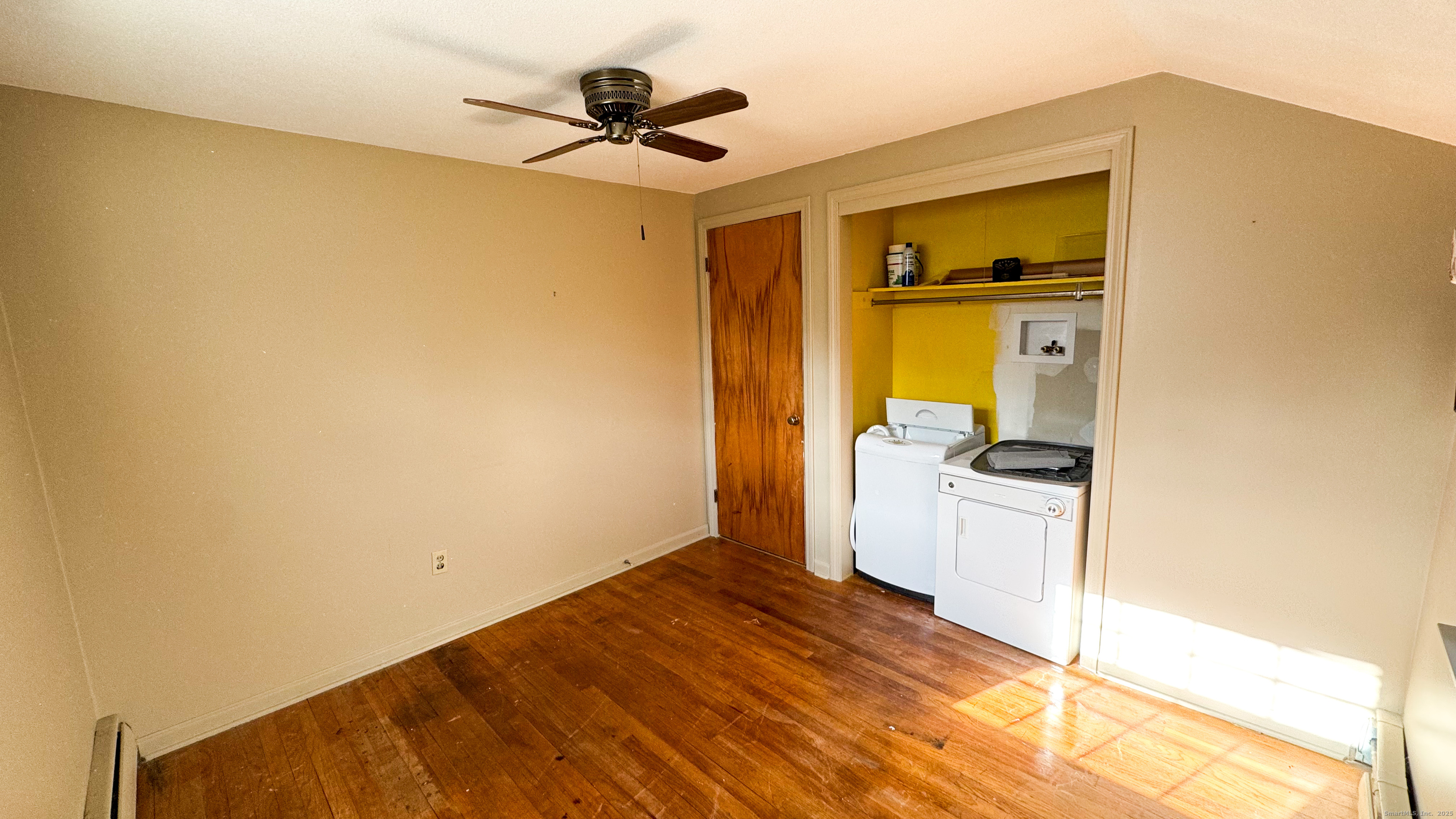 338 Main Street Hampton, CT 06247 - Photo 28 of 31 a view of a kitchen with a sink and a refrigerator