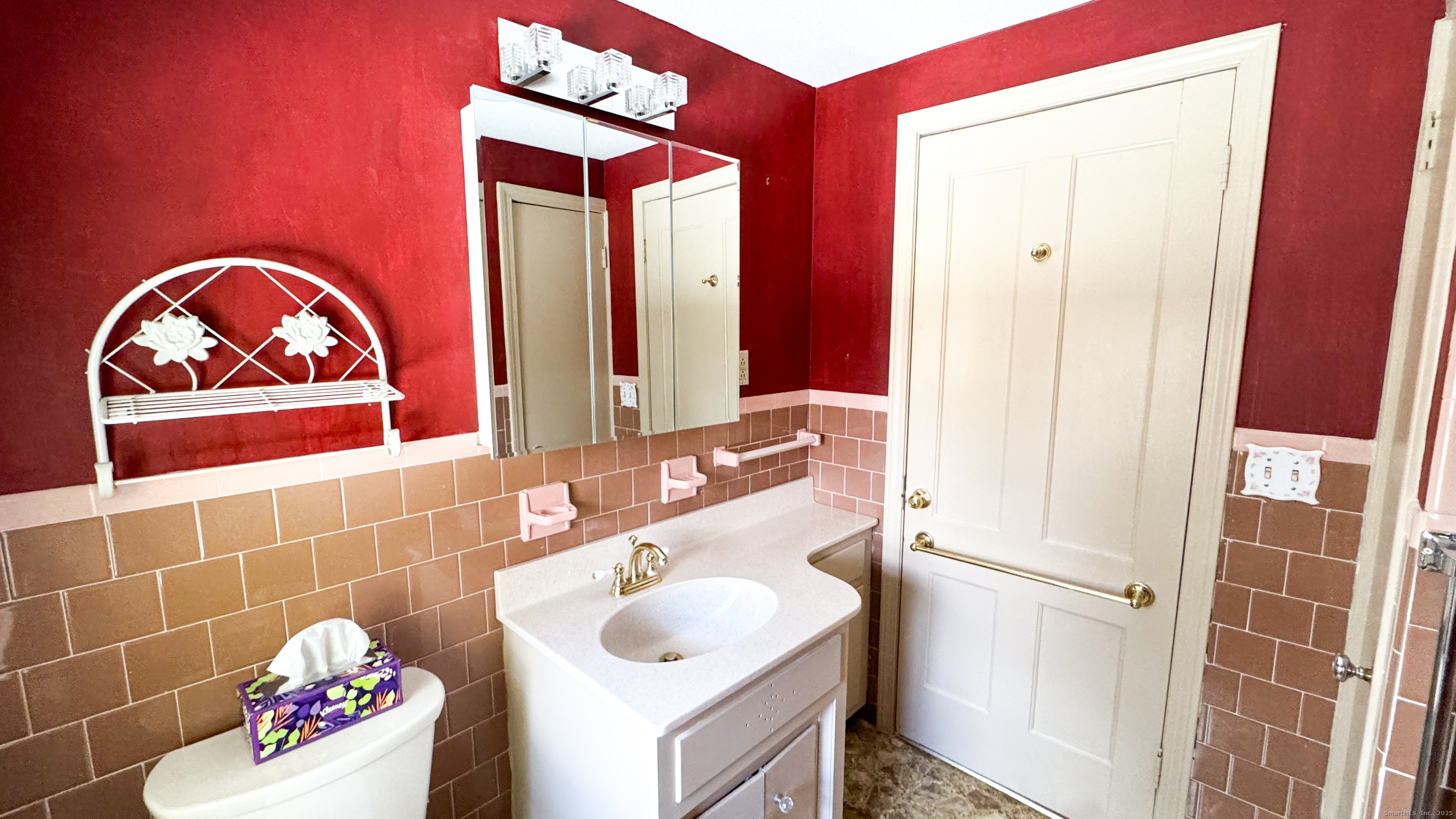 338 Main Street Hampton, CT 06247 - Photo 29 of 31 a bathroom with a sink and a mirror