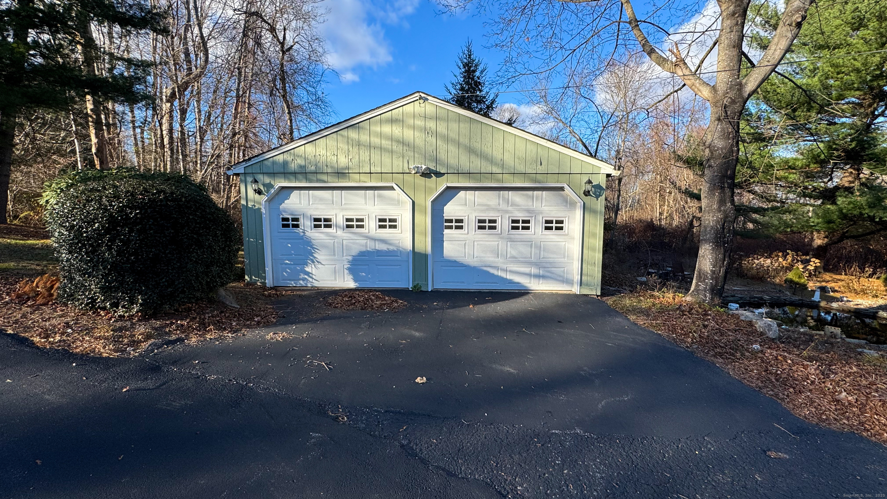 338 Main Street Hampton, CT 06247 - Photo 9 of 31 a front view of a house with a yard