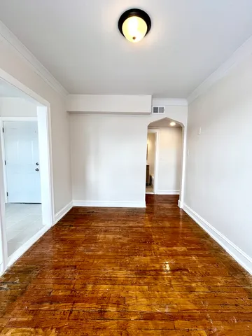 a view of an empty room and window