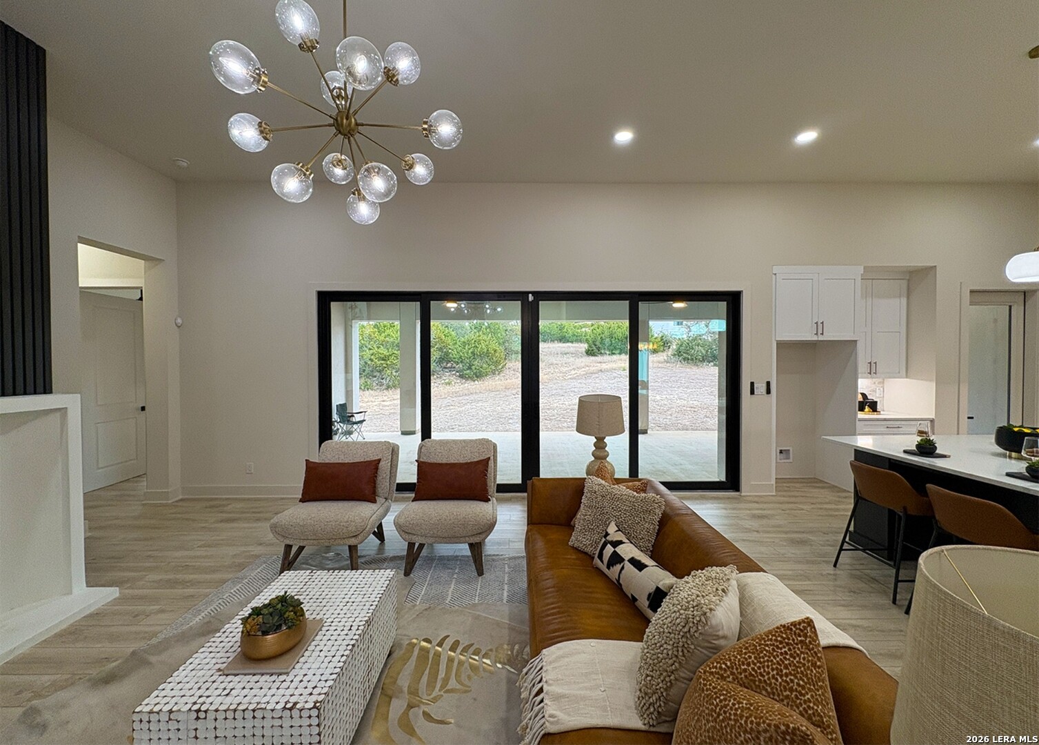 11010 Nina Ridge San Antonio, TX 78255 - Photo 11 of 44 a living room with furniture and a large window