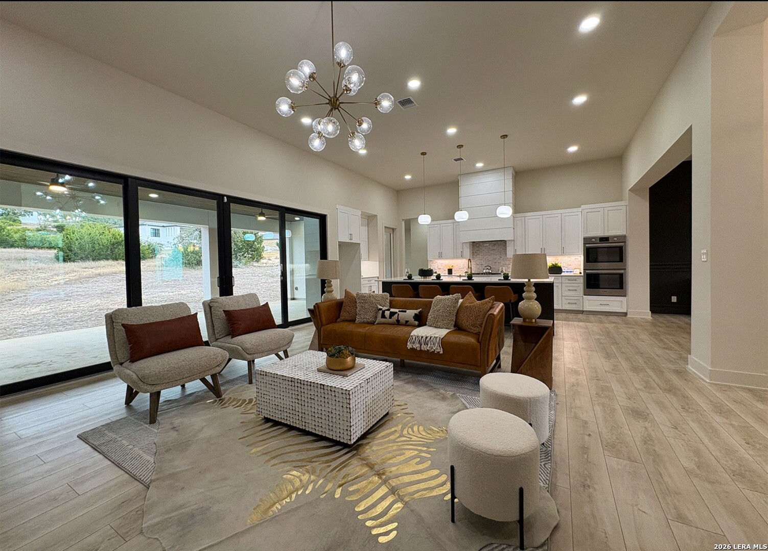 11010 Nina Ridge San Antonio, TX 78255 - Photo 12 of 44 a living room with furniture and a large window