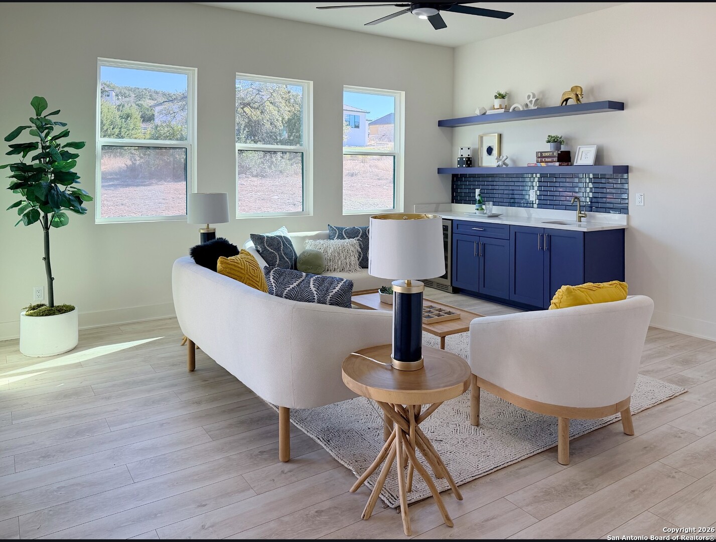 11010 Nina Ridge San Antonio, TX 78255 - Photo 16 of 44 a living room with furniture and a potted plant