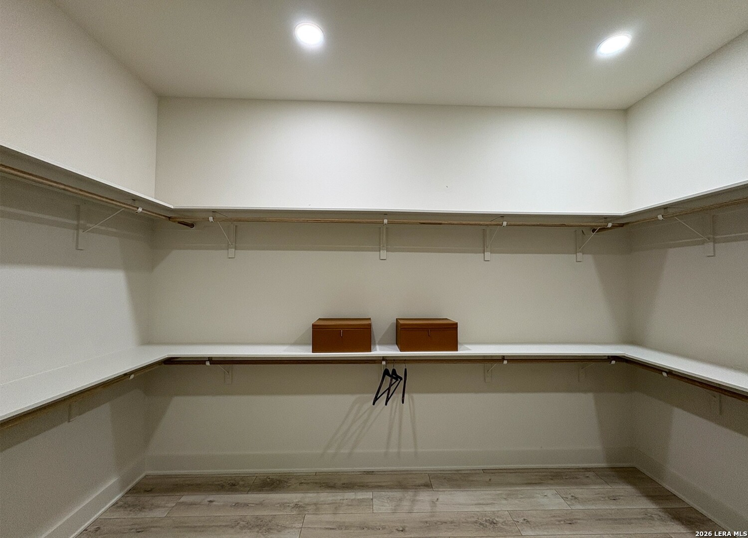 11010 Nina Ridge San Antonio, TX 78255 - Photo 25 of 44 a view of storage and utility room with empty racks