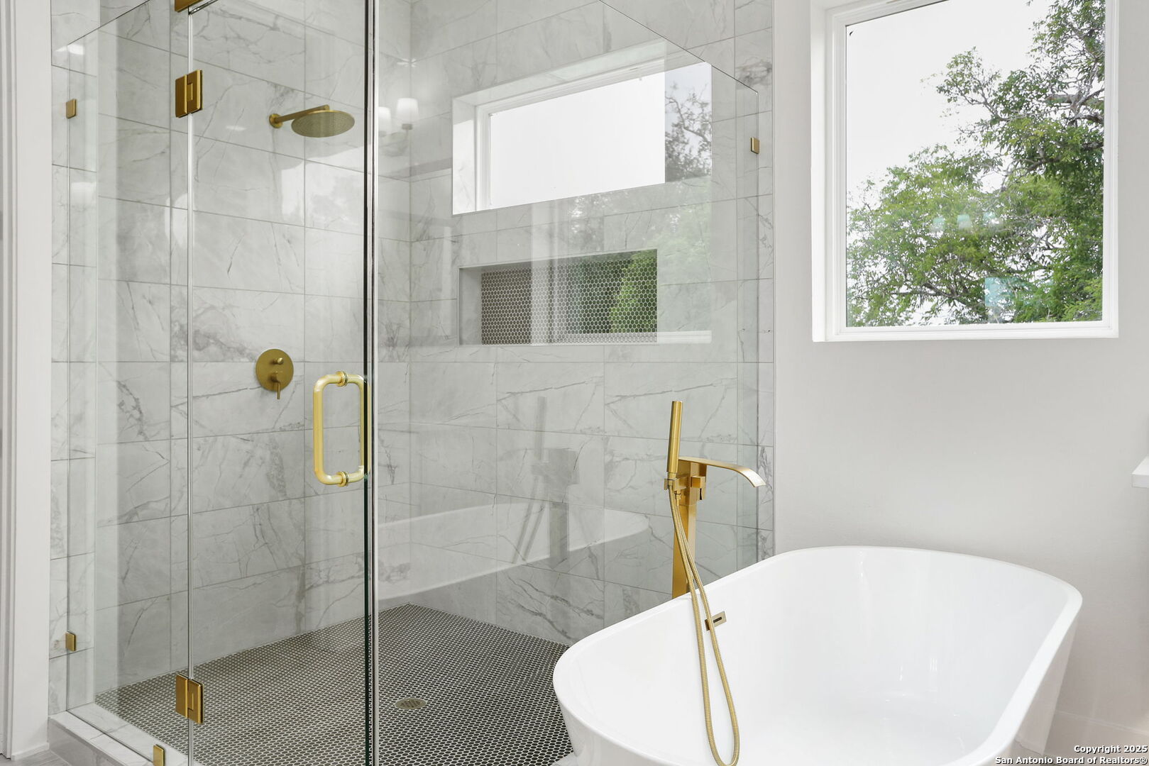 11010 Nina Ridge San Antonio, TX 78255 - Photo 33 of 44 a bathroom with a bathtub and shower