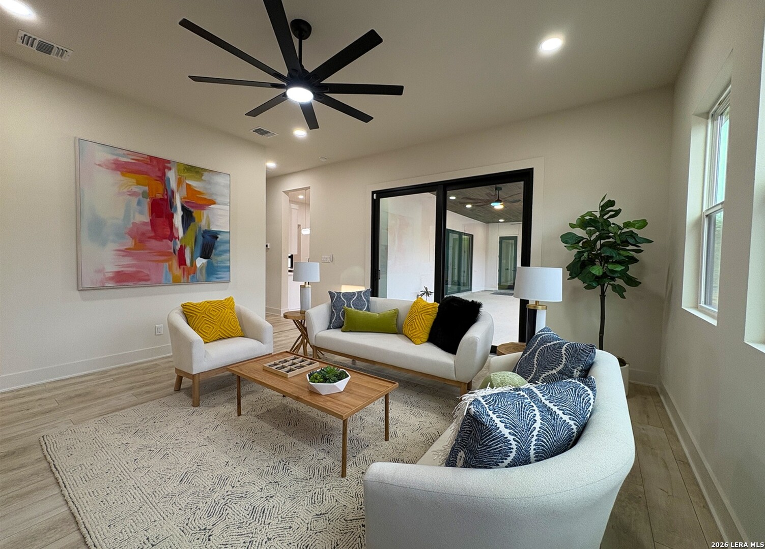 11010 Nina Ridge San Antonio, TX 78255 - Photo 39 of 44 a living room with furniture and a large window