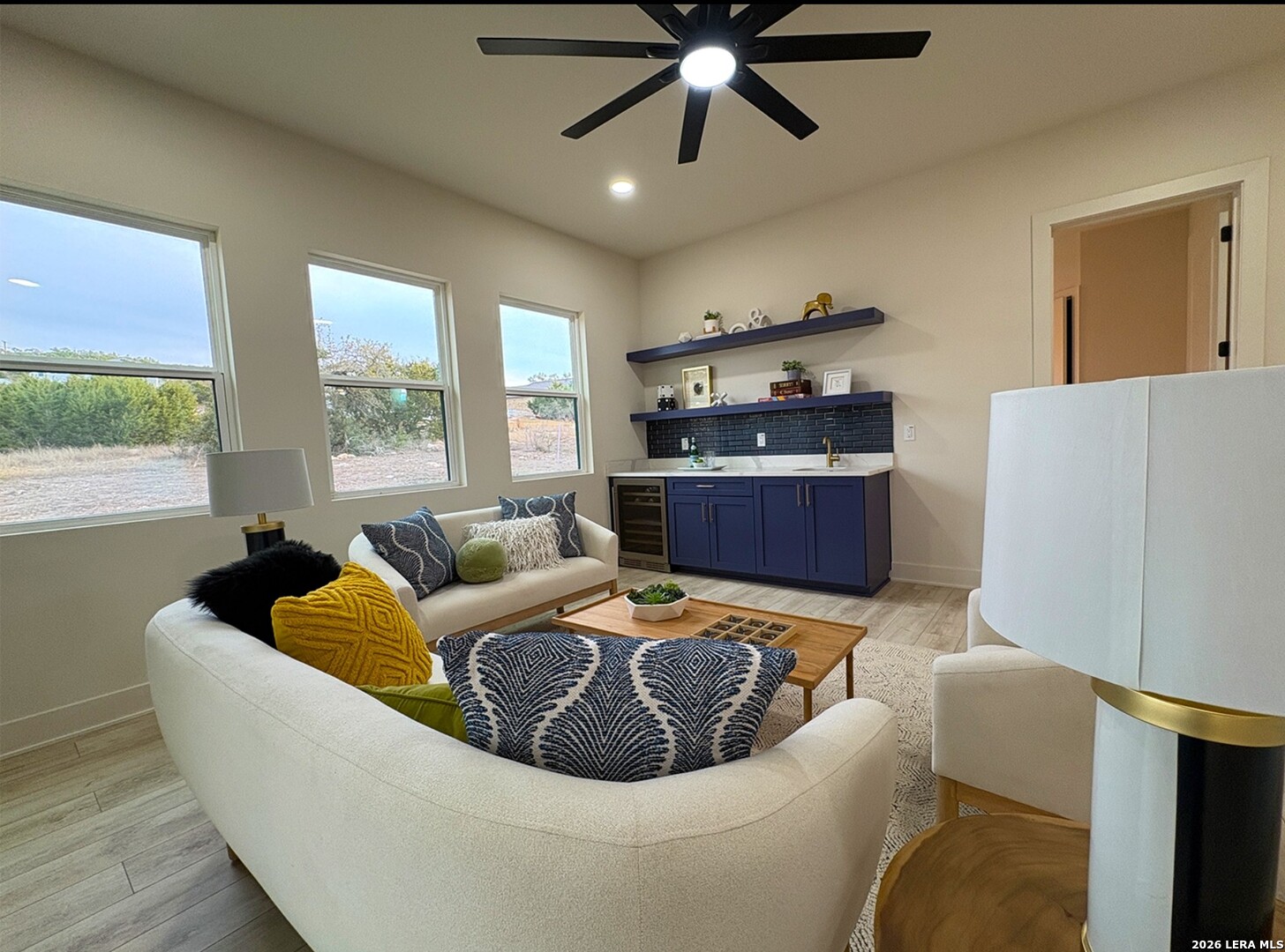 11010 Nina Ridge San Antonio, TX 78255 - Photo 40 of 44 a living room with furniture and a window