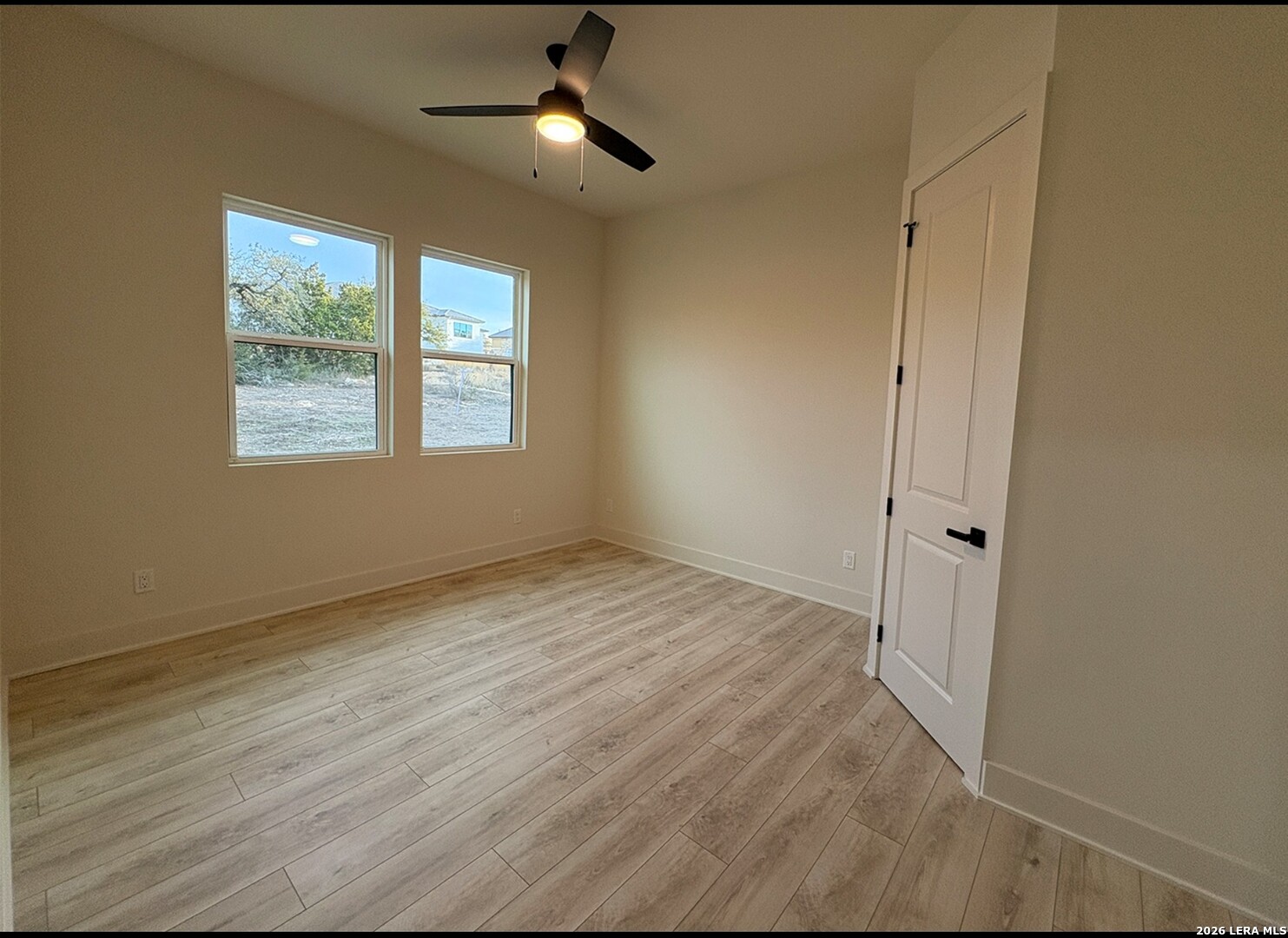 11010 Nina Ridge San Antonio, TX 78255 - Photo 41 of 44 a view of an empty room with a window
