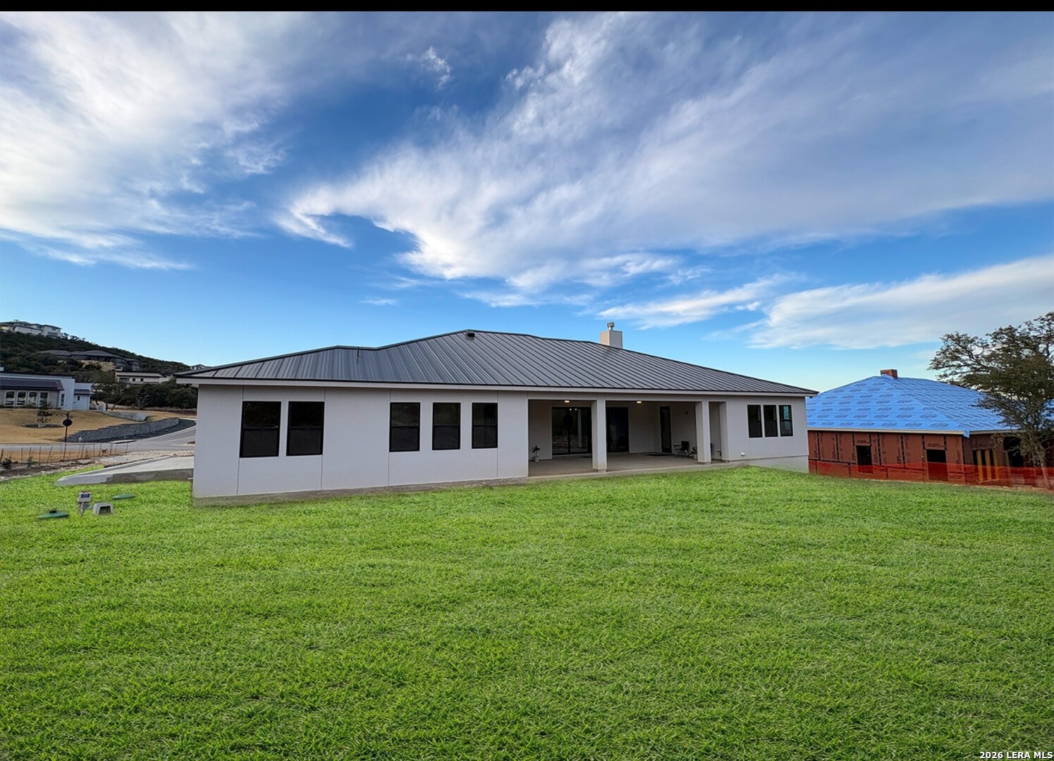 11010 Nina Ridge San Antonio, TX 78255 - Photo 44 of 44 a house view with a garden space