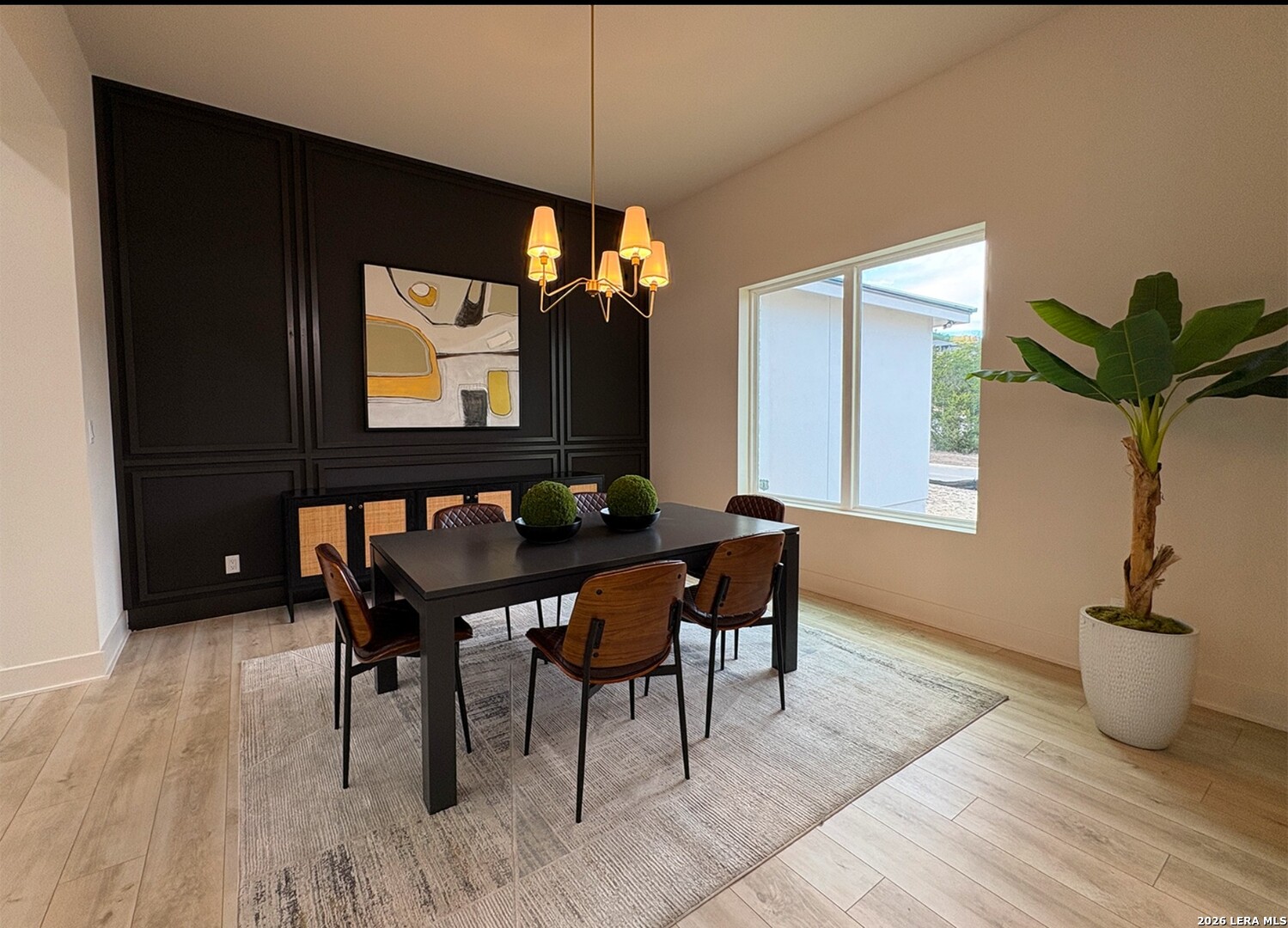 11010 Nina Ridge San Antonio, TX 78255 - Photo 5 of 44 a living room with furniture a potted plant and a flat screen tv