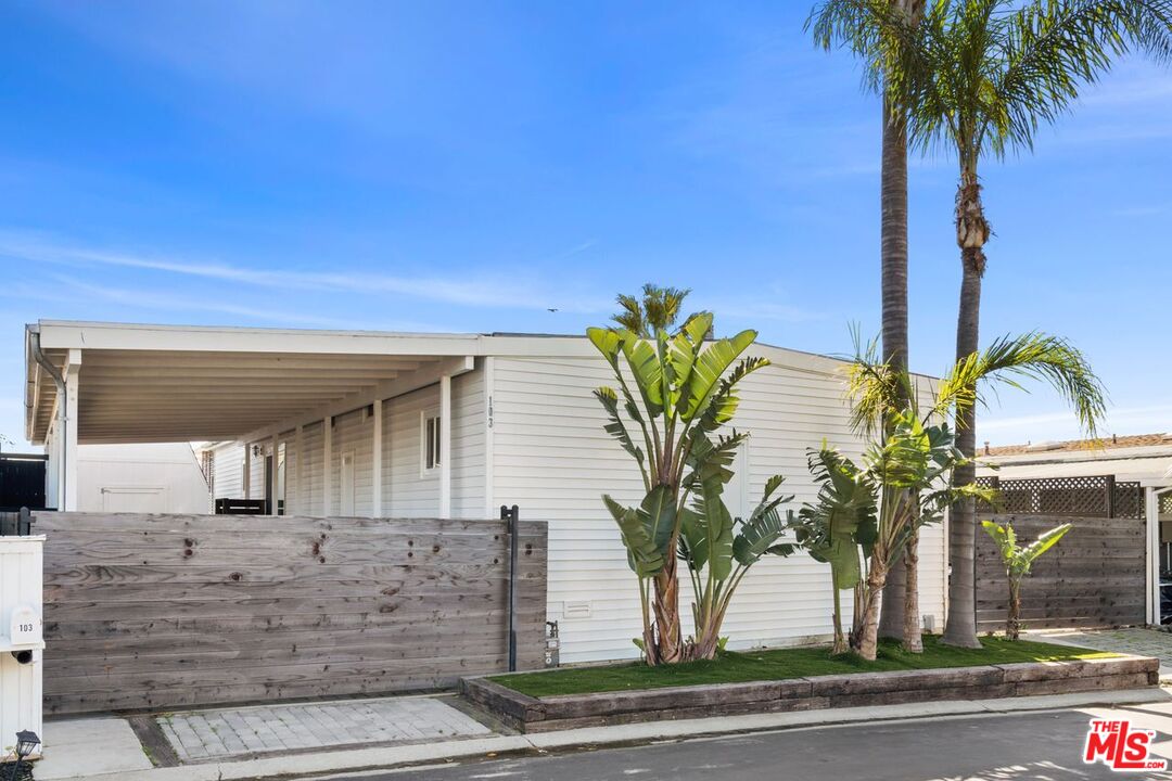 29500 Heathercliff Road, Unit SPC 103 Malibu, CA 90265 - Photo 14 of 15 a front view of a house with garden