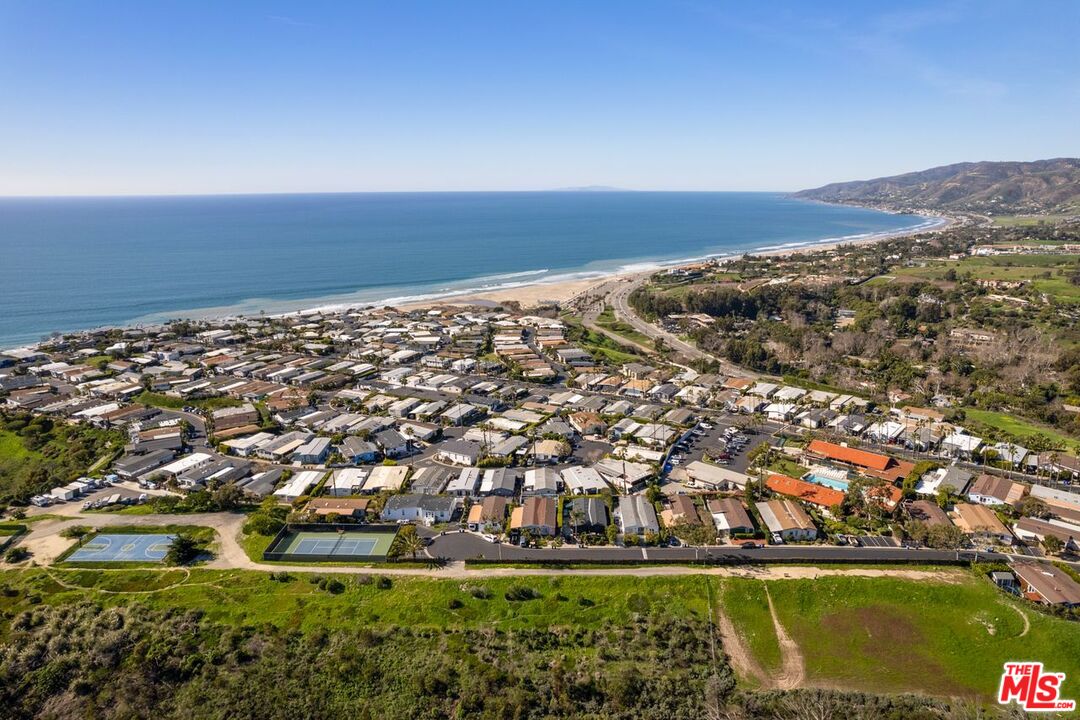29500 Heathercliff Road, Unit SPC 103 Malibu, CA 90265 - Photo 15 of 15 an aerial view of a house with a yard