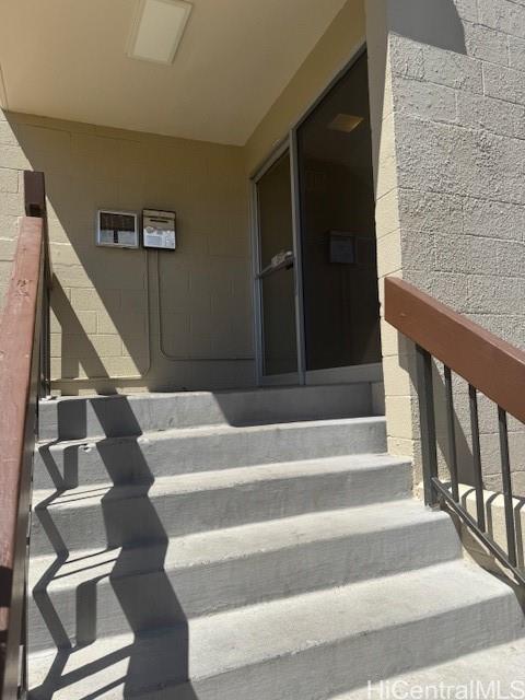 1401 Lusitana Street, Unit 305 Honolulu, HI 96813 - Photo 14 of 17 a view of staircase with white walls and a black gate