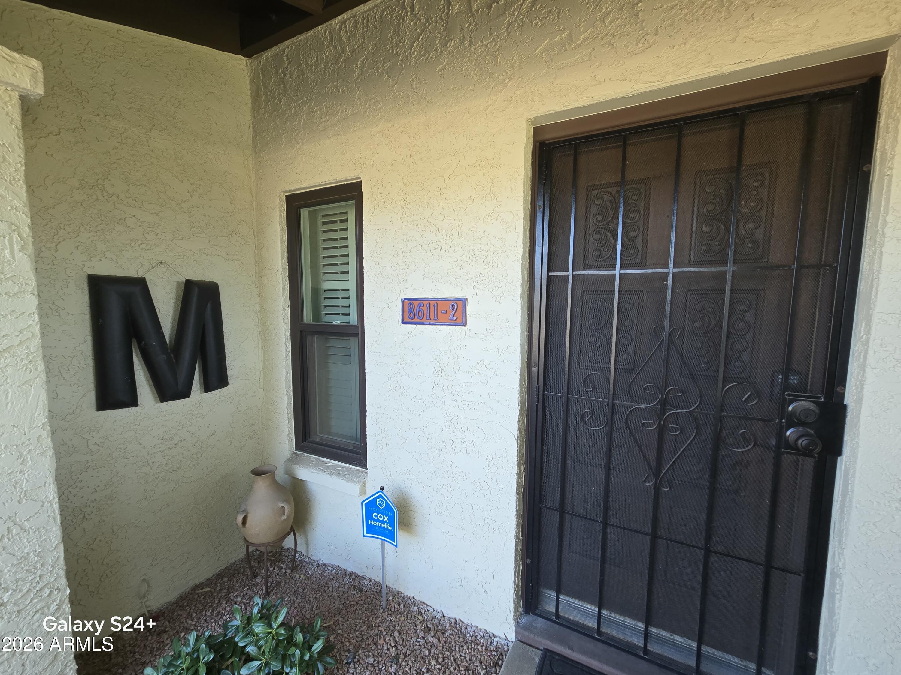 8611 South 48th Street, Unit 2 Phoenix, AZ 85044 - Photo 3 of 12 a bathroom with a toilet and sink