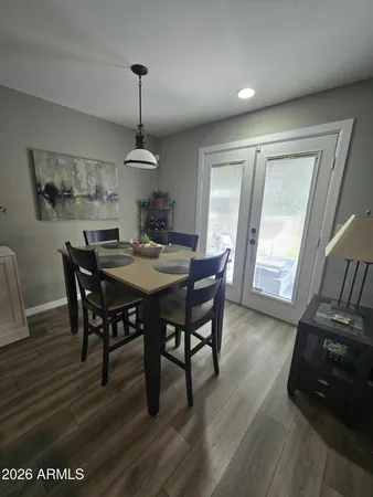 a bedroom with a bed couch and window