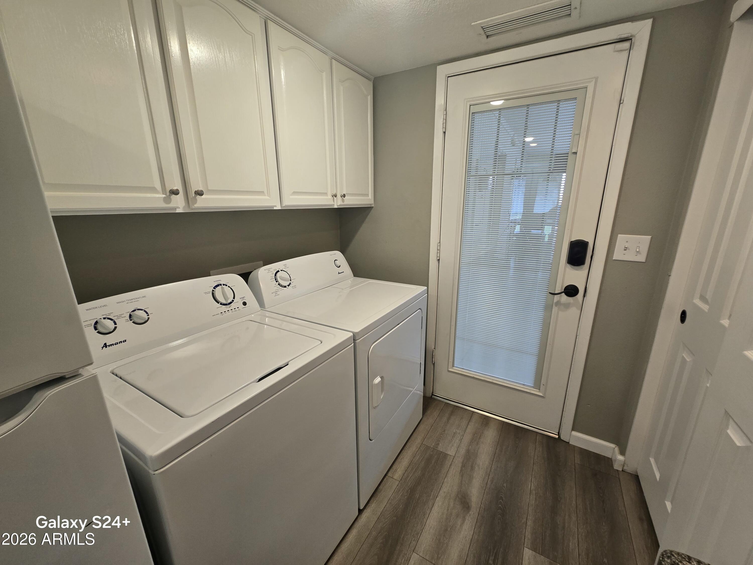 8611 South 48th Street, Unit 2 Phoenix, AZ 85044 - Photo 9 of 12 a utility room with dryer and washer