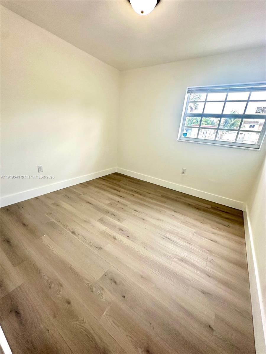 3947 Northwest 207 St Road Miami Gardens, FL 33055 - Photo 16 of 23 an empty room with windows