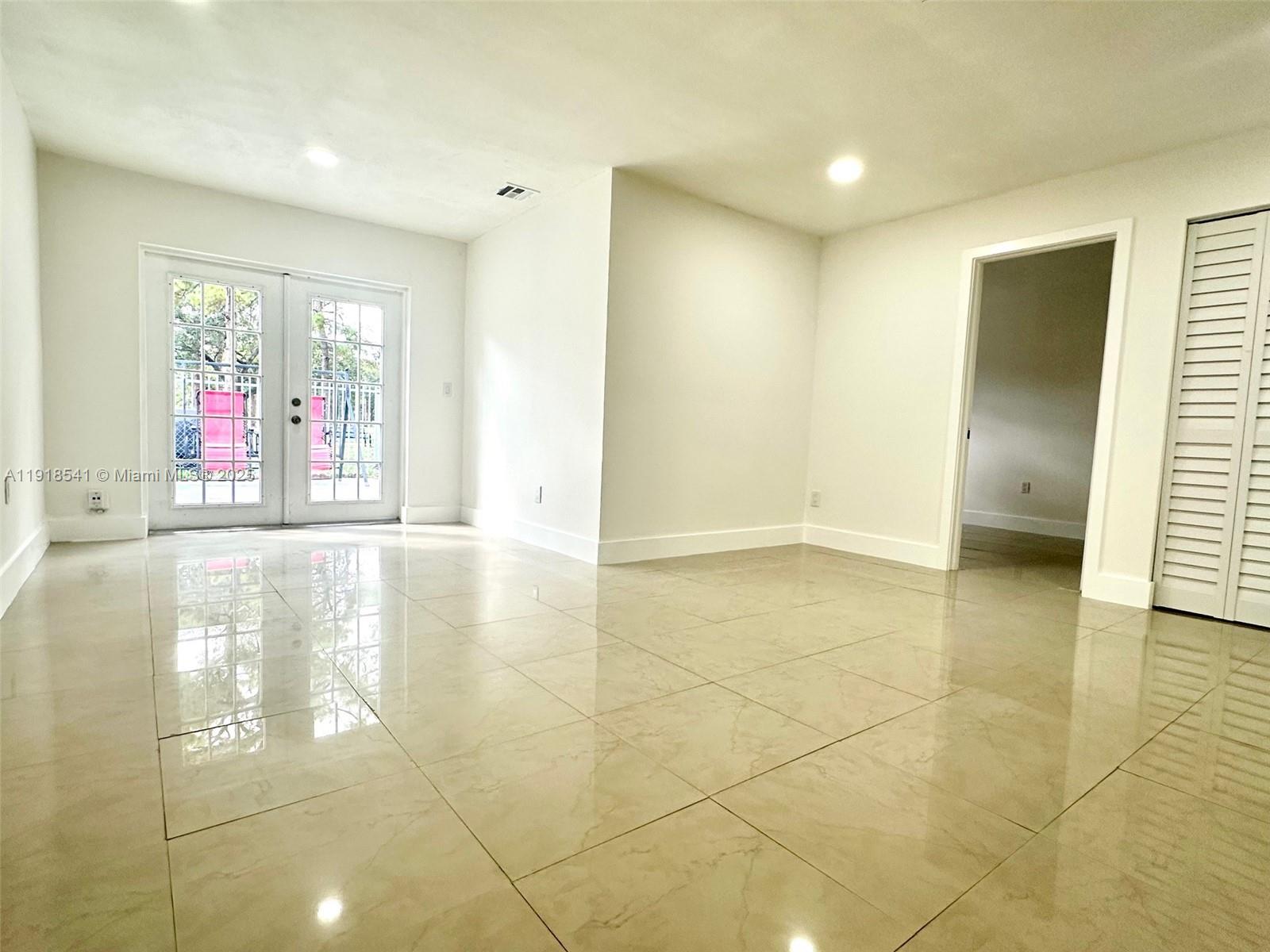 3947 Northwest 207 St Road Miami Gardens, FL 33055 - Photo 5 of 23 a view of an empty room