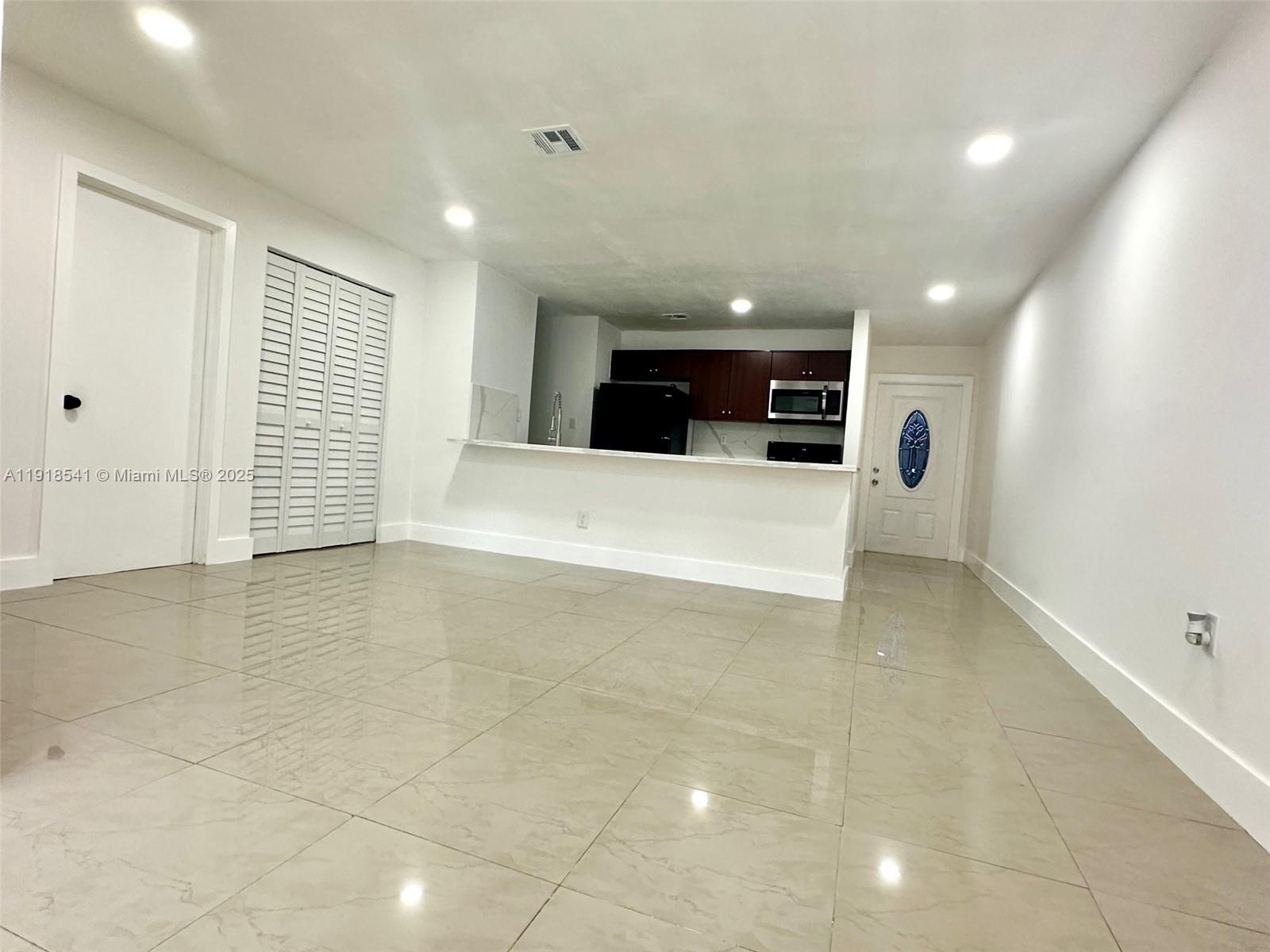 3947 Northwest 207 St Road Miami Gardens, FL 33055 - Photo 6 of 23 a view of entryway with kitchen