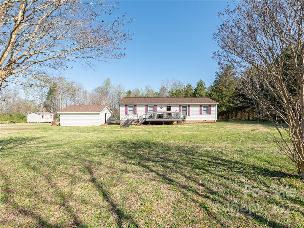 162 Alex Road Cleveland, NC 27013 - Photo 1 of 30 a view of a house with a yard and sitting area