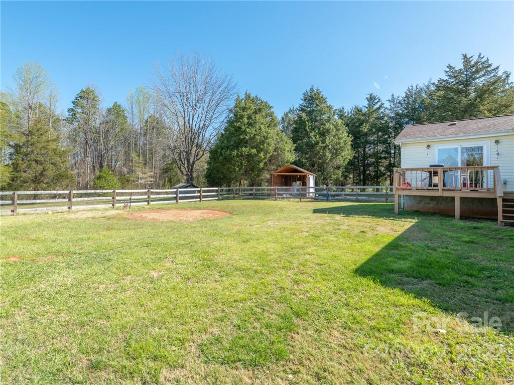 162 Alex Road Cleveland, NC 27013 - Photo 21 of 30 a house view with swimming pool in front of it