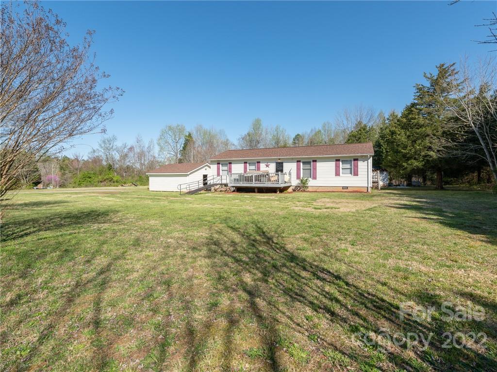 162 Alex Road Cleveland, NC 27013 - Photo 28 of 30 a view of a city with tall buildings in the background