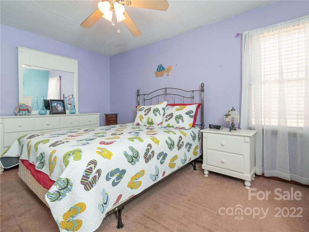162 Alex Road Cleveland, NC 27013 - Photo 5 of 30 a bedroom with a bed and a window