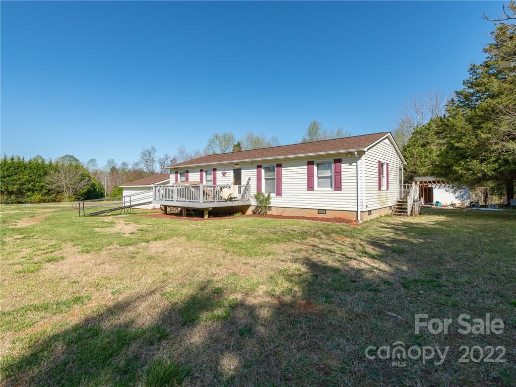 162 Alex Road Cleveland, NC 27013 - Photo 8 of 30 a view of a house with a big yard