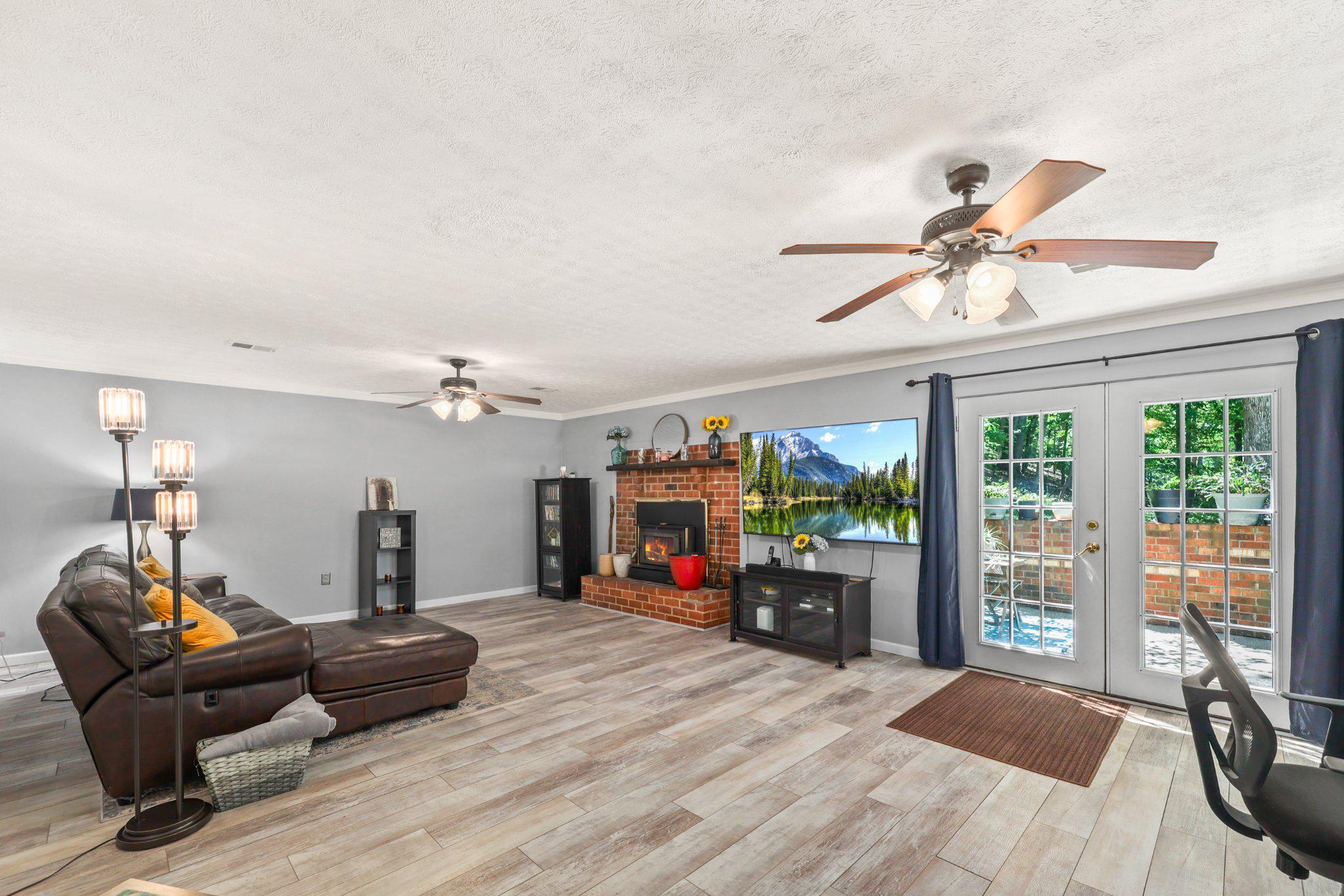 7357 Auburn Mill Road Warrenton, VA 20187 - Photo 19 of 35 Luxury vinyl plank flooring w/French doors. Patio