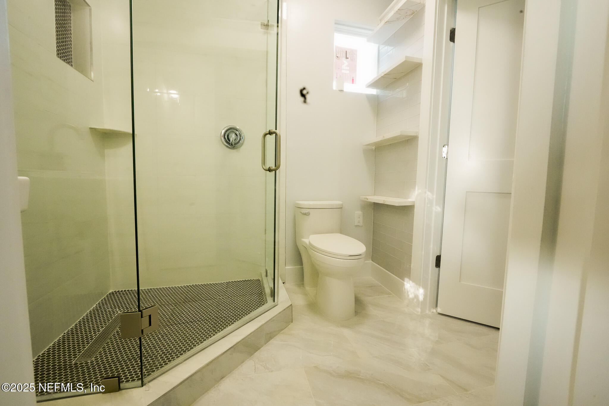 1932 Hubbard Street, Unit 1 Jacksonville, FL 32206 - Photo 2 of 5 a bathroom with a shower and a toilet