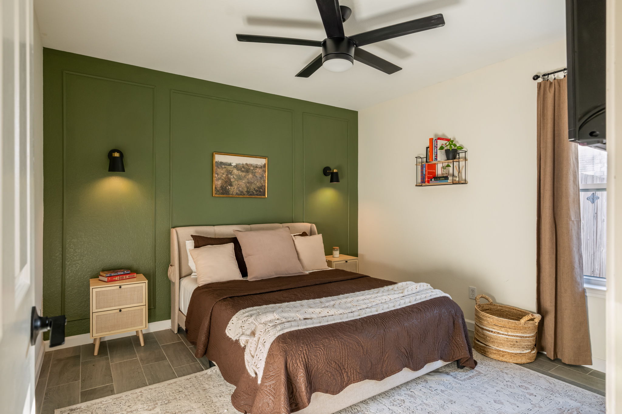 164 Johnnys Way Kyle, TX 78640 - Photo 16 of 24 a bedroom with a bed and a chandelier