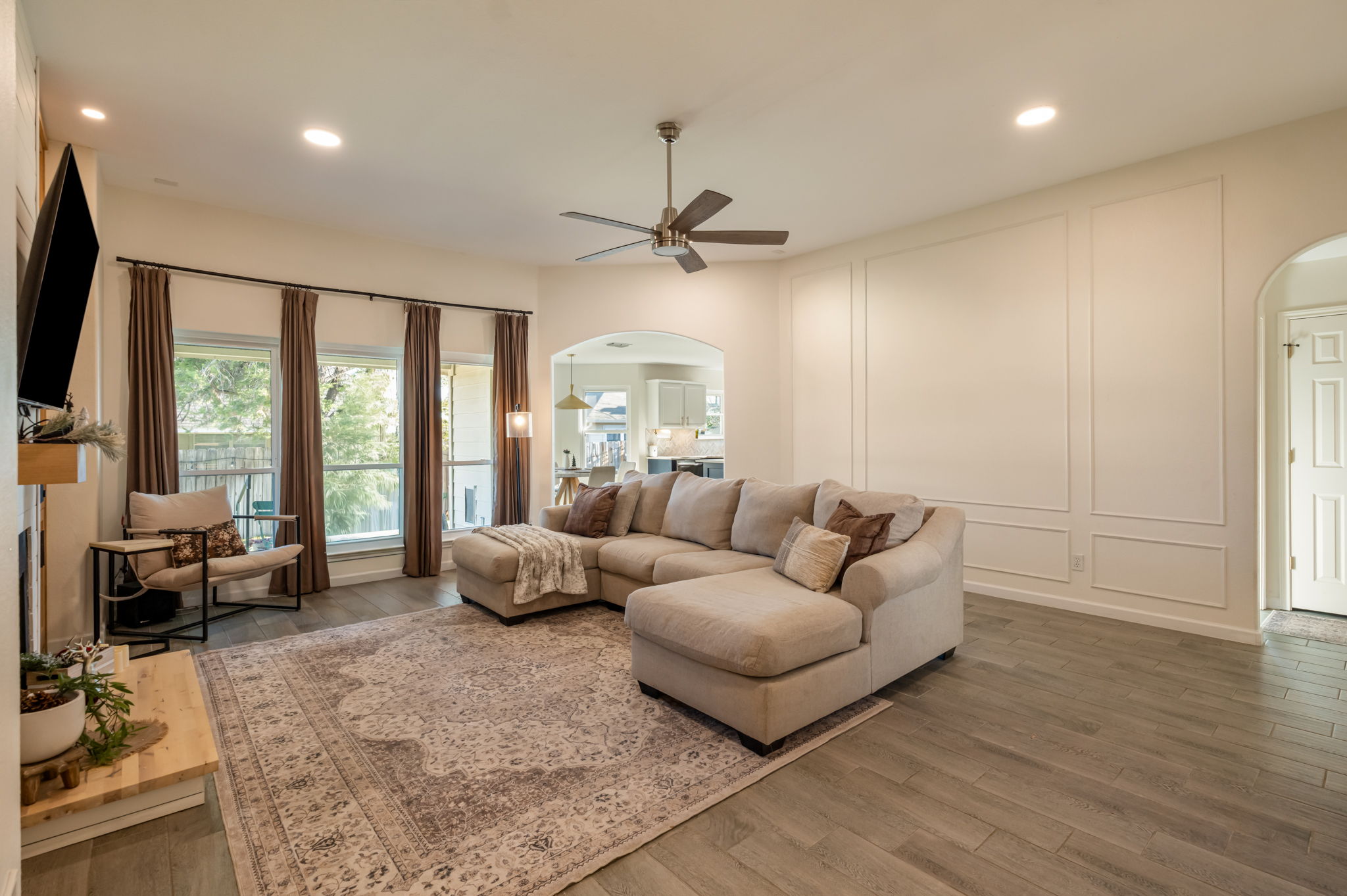164 Johnnys Way Kyle, TX 78640 - Photo 5 of 24 a living room with furniture and a large window