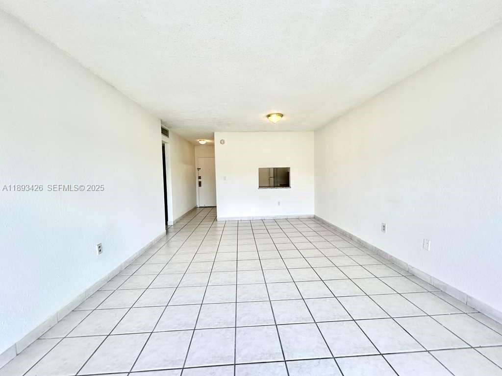 4920 Northwest 79th Avenue, Unit 307 Doral, FL 33166 - Photo 11 of 21 a view of an empty room