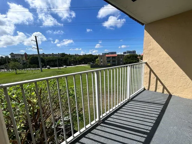 a view of a city skyline from a balcony