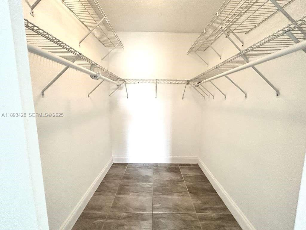 4920 Northwest 79th Avenue, Unit 307 Doral, FL 33166 - Photo 19 of 21 a view of a room with a window