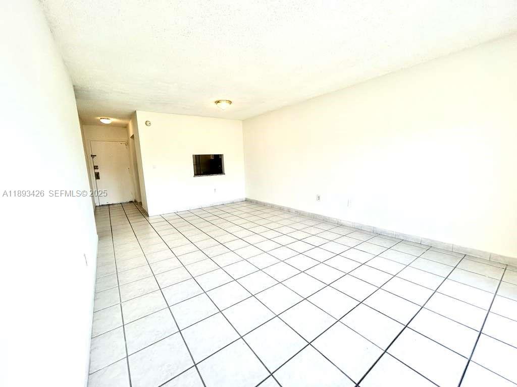 4920 Northwest 79th Avenue, Unit 307 Doral, FL 33166 - Photo 10 of 21 a view of an empty room