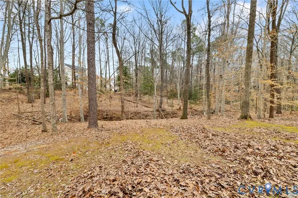a view of a backyard of the house