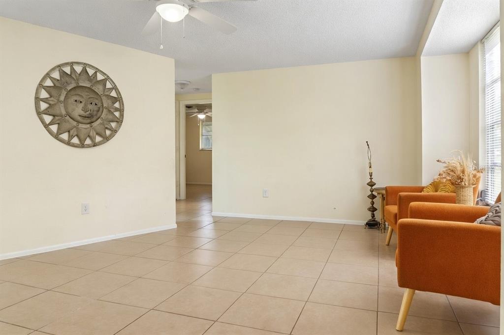 340 Periwinkle Road Venice, FL 34293 - Photo 11 of 36 a view of a livingroom with furniture and a window