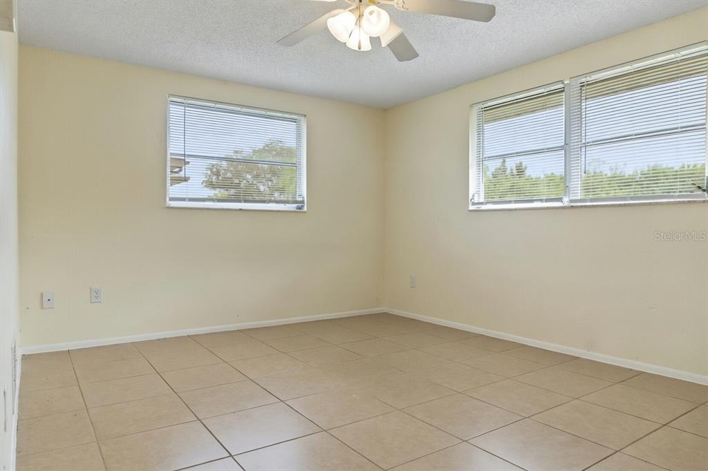 340 Periwinkle Road Venice, FL 34293 - Photo 16 of 36 an empty room with a window