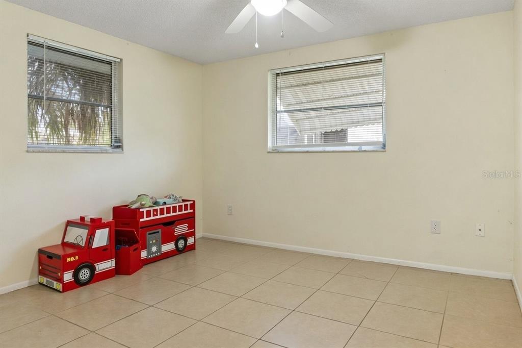 340 Periwinkle Road Venice, FL 34293 - Photo 19 of 36 a room with toys and dresser