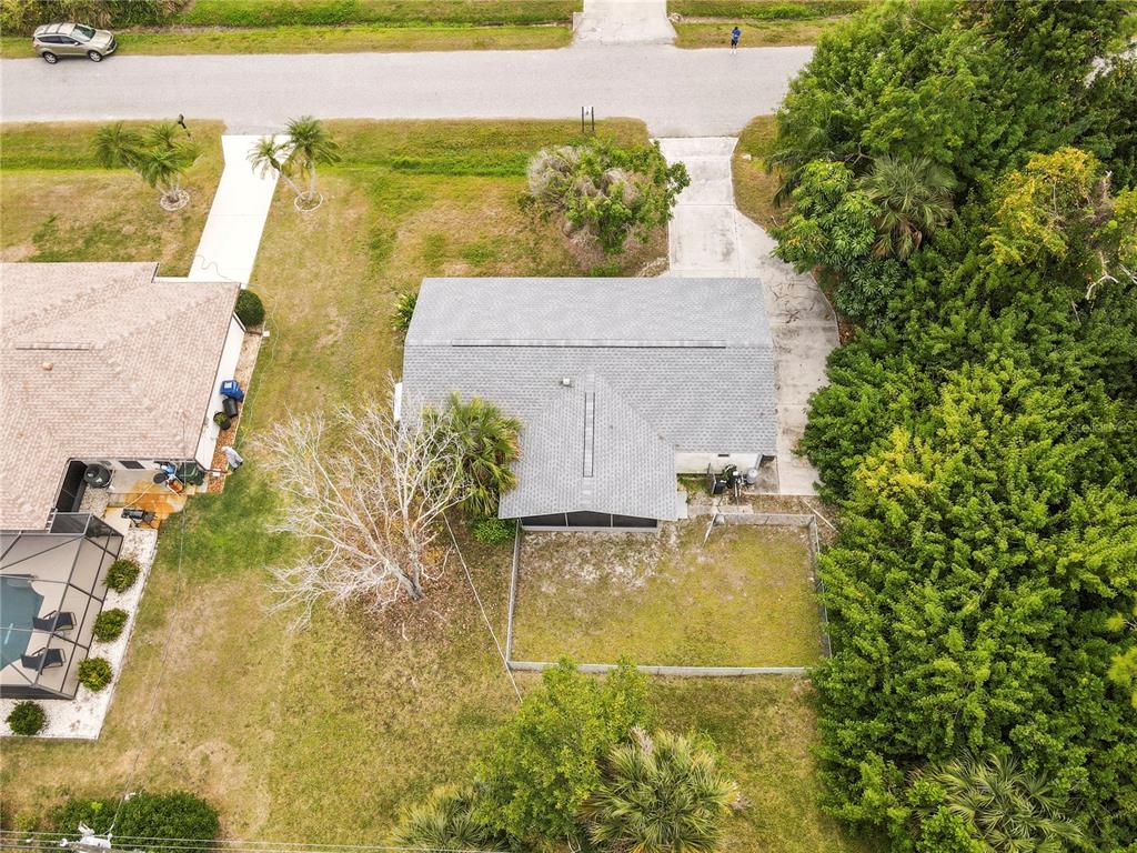 340 Periwinkle Road Venice, FL 34293 - Photo 23 of 36 an aerial view of residential houses with outdoor space and swimming pool